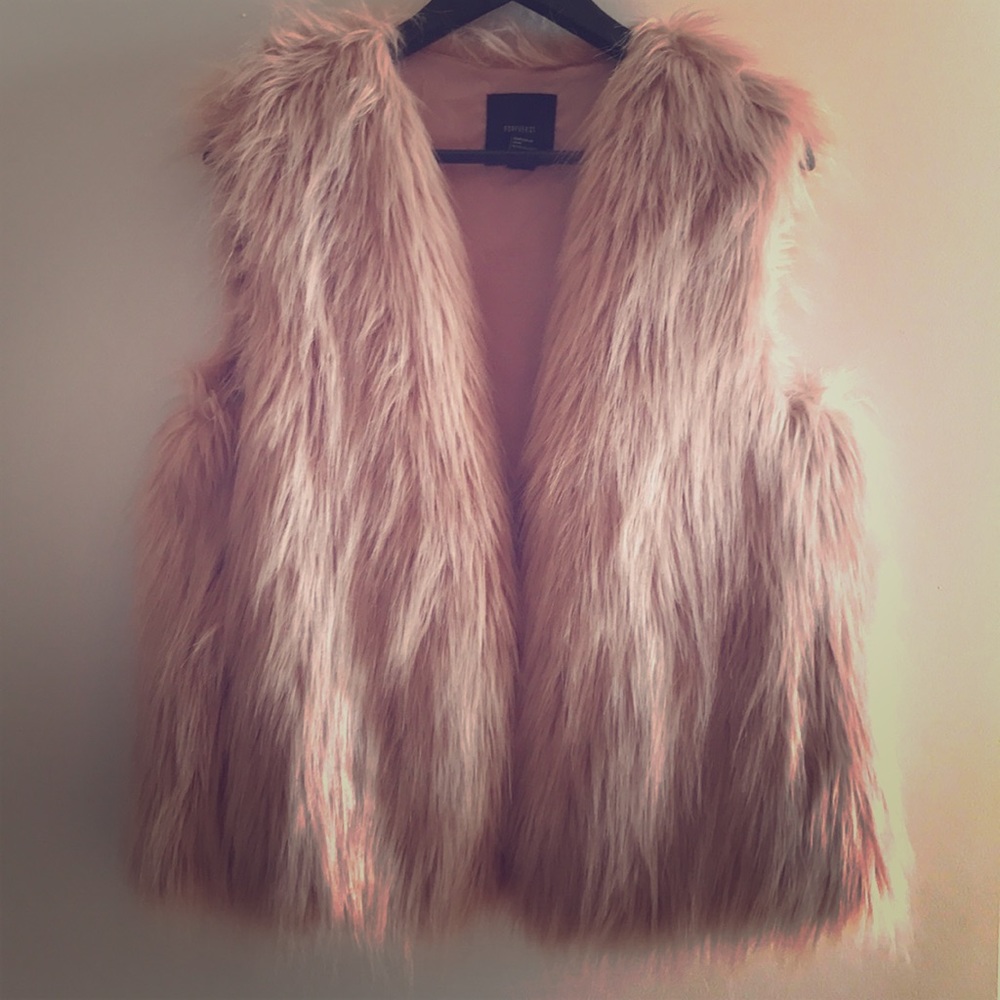 Blush colored faux vests.